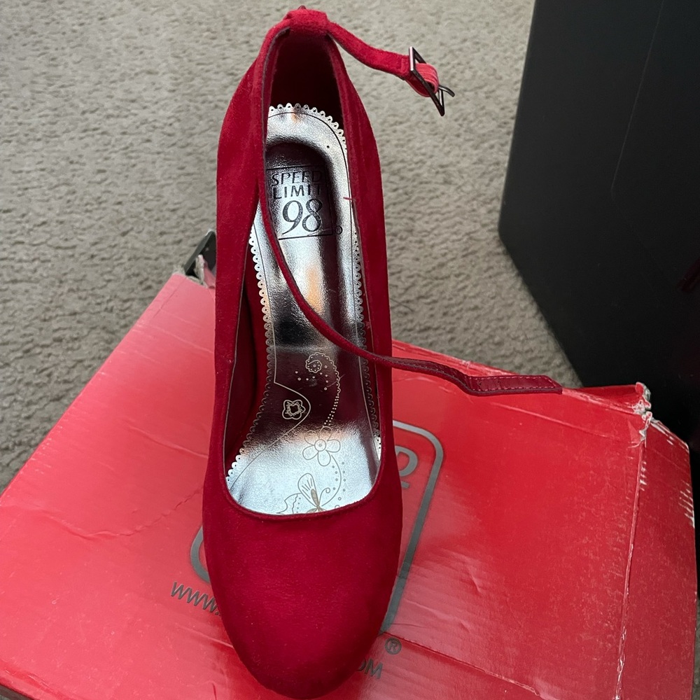Red Spiked Heels